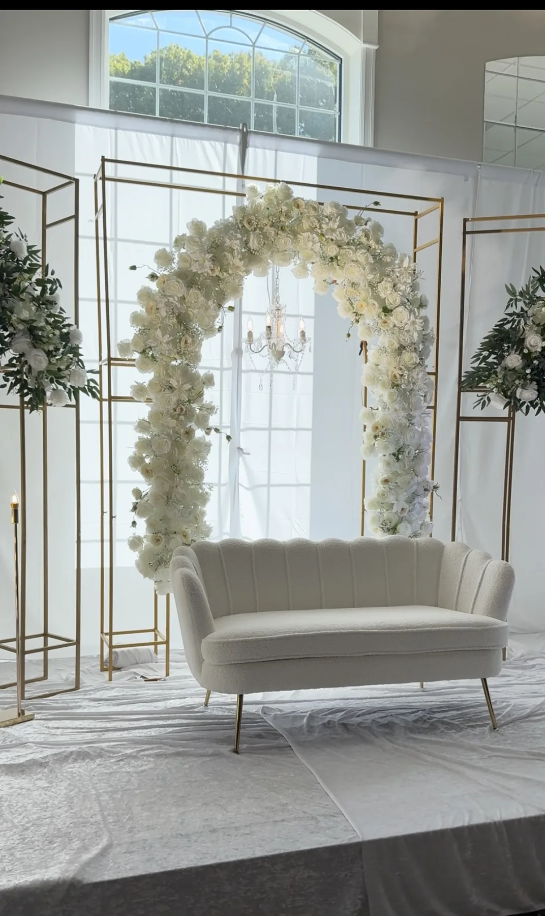 Western New York event stage decor with elegant floral styling.